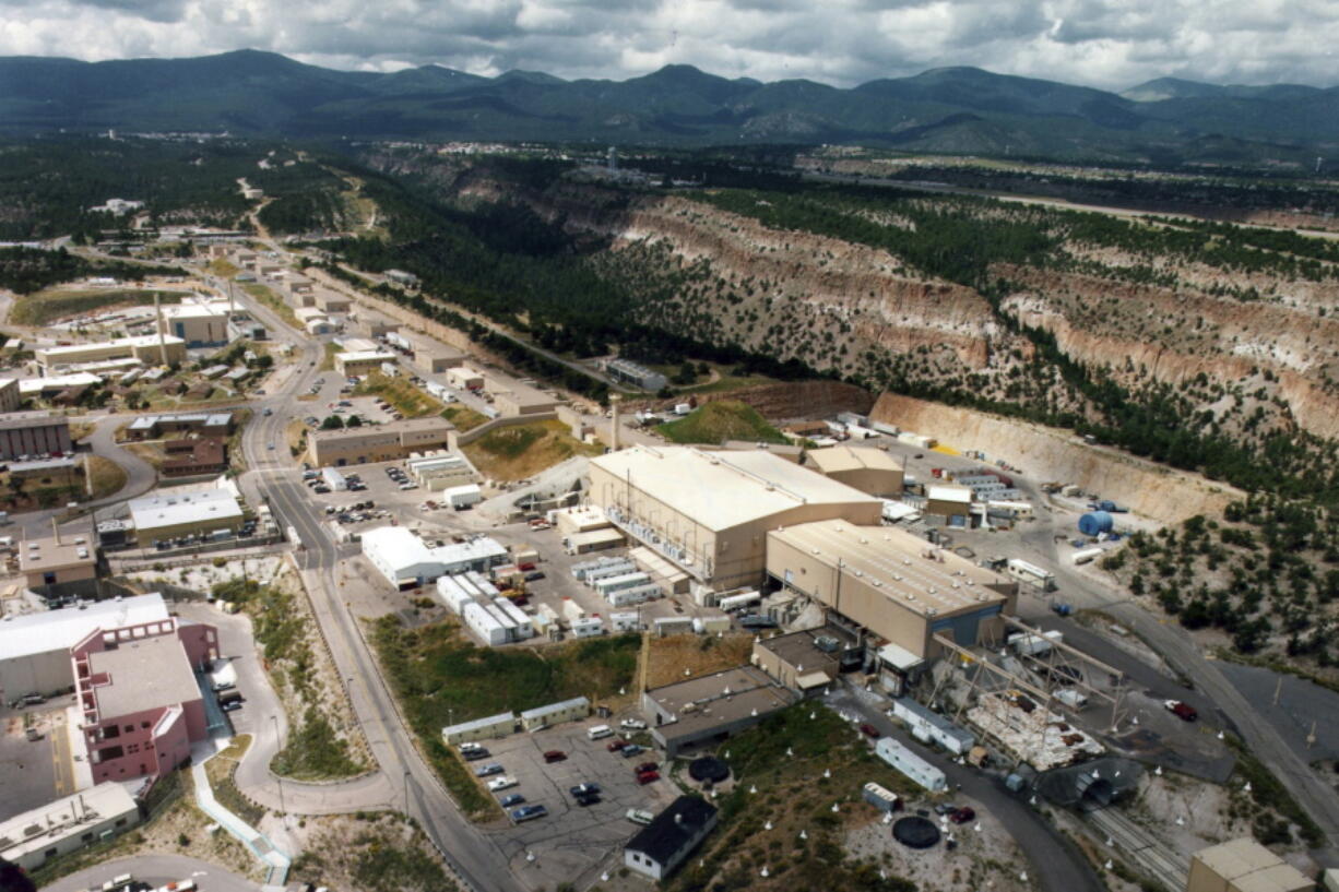 FILE - This undated file photo shows the Los Alamos National Laboratory in Los Alamos, N.M. New Mexico Indigenous leaders are concerned about a proposed multimillion-dollar transmission line that would cross what they consider sacred lands. The transmission line planned by the U.S. government would bring more electricity to Los Alamos National Laboratory as it looks to power ongoing operations and future missions at the northern New Mexico complex that include manufacturing key components for the nation's nuclear arsenal.