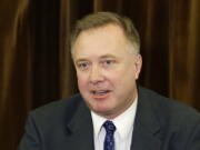 FILE - Washington Sen. Doug Ericksen, R-Ferndale, talks to reporters on Feb. 2, 2017 at the Capitol in Olympia, Wash. Ericksen died Friday, Dec. 17, 2021, after saying in November that he tested positive for COVID-19, although his cause of death was not immediately confirmed on Saturday. He was 52.  (AP Photo/Ted S.