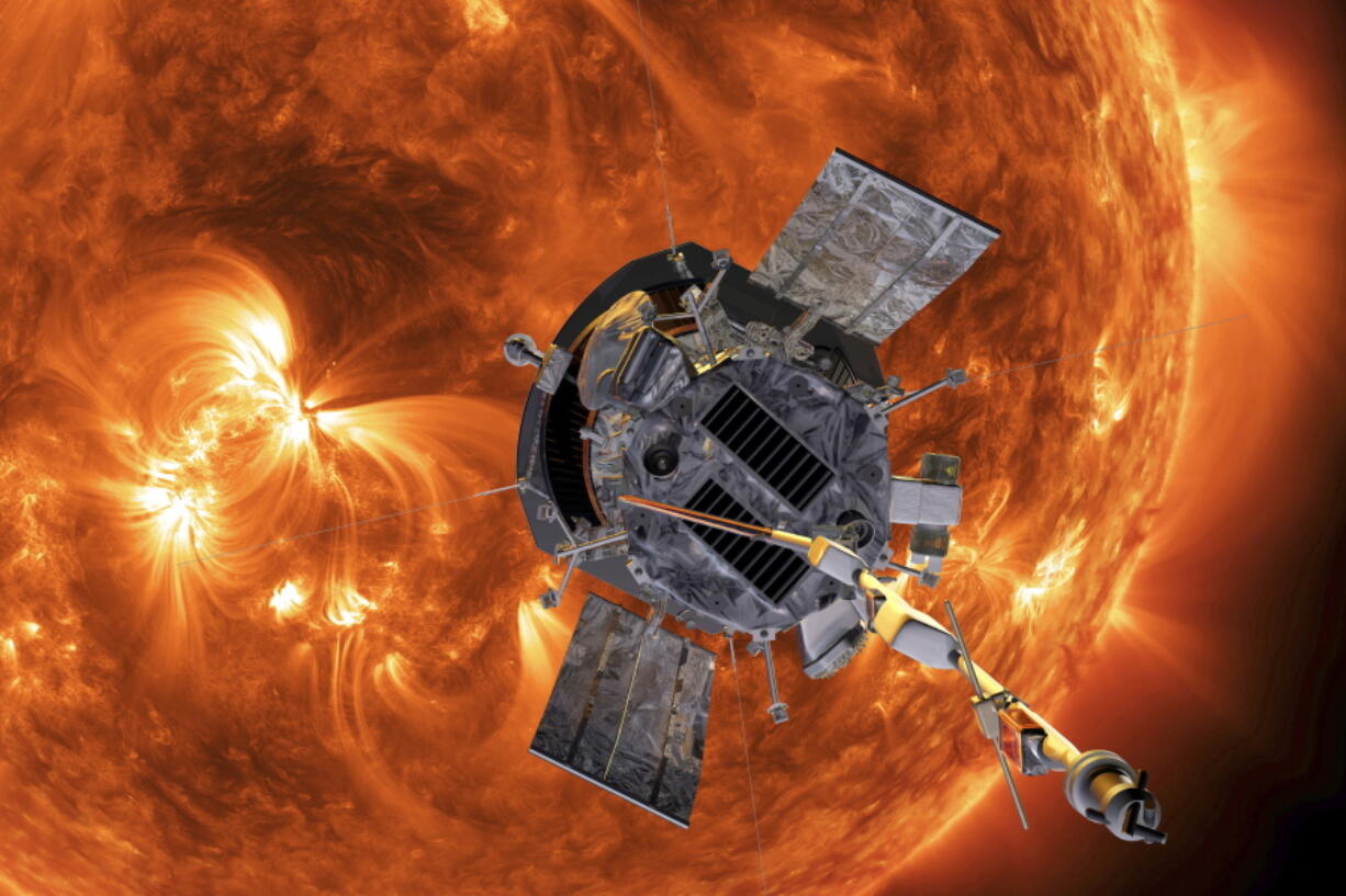 FILE - This image made available by NASA shows an artist's rendering of the Parker Solar Probe approaching the Sun. On Tuesday, Dec. 14, 2021, NASA announced that the spacecraft has plunged through the unexplored solar atmosphere known as the corona in April, and will keep drawing ever closer to the sun and diving deeper into the corona.