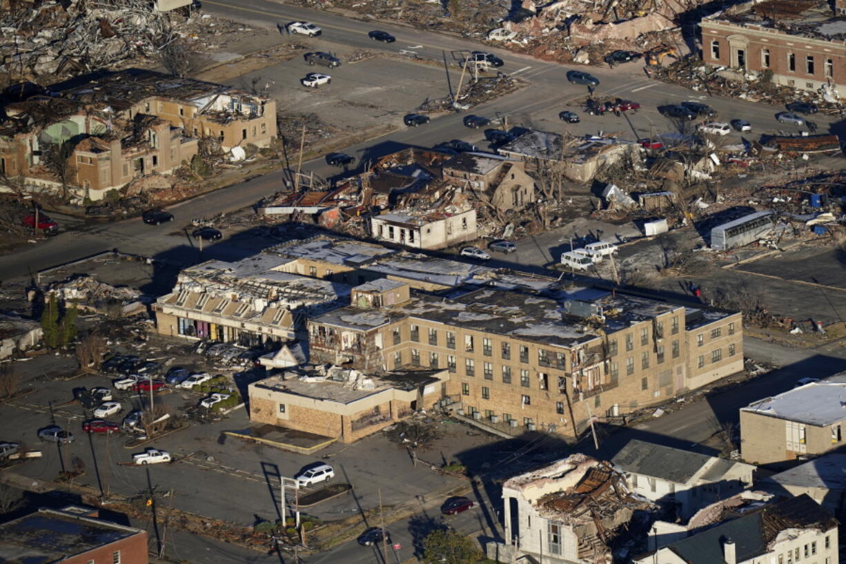 In this aerial photo, destruction from a recent tornado is seen Dec. 12 in downtown Mayfield, Ky. According to a study presented at the American Geophysical Union conference on Dec. 13, nasty winter tornadoes -- like the deadly one that hit five states -- are likely to be stronger and stay on the ground longer with a wider swath of destruction in a warming world.