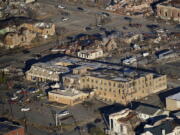 In this aerial photo, destruction from a recent tornado is seen Dec. 12 in downtown Mayfield, Ky. According to a study presented at the American Geophysical Union conference on Dec. 13, nasty winter tornadoes -- like the deadly one that hit five states -- are likely to be stronger and stay on the ground longer with a wider swath of destruction in a warming world.