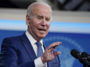 President Joe Biden speaks in the South Court Auditorium on the White House campus, Wednesday, Dec. 1, 2021, in Washington. Biden is set to kick of more urgent campaign for Americans to get COVID-19 booster shots on Dec. 2, as he unveils a his winter plans to combat the coronavirus.