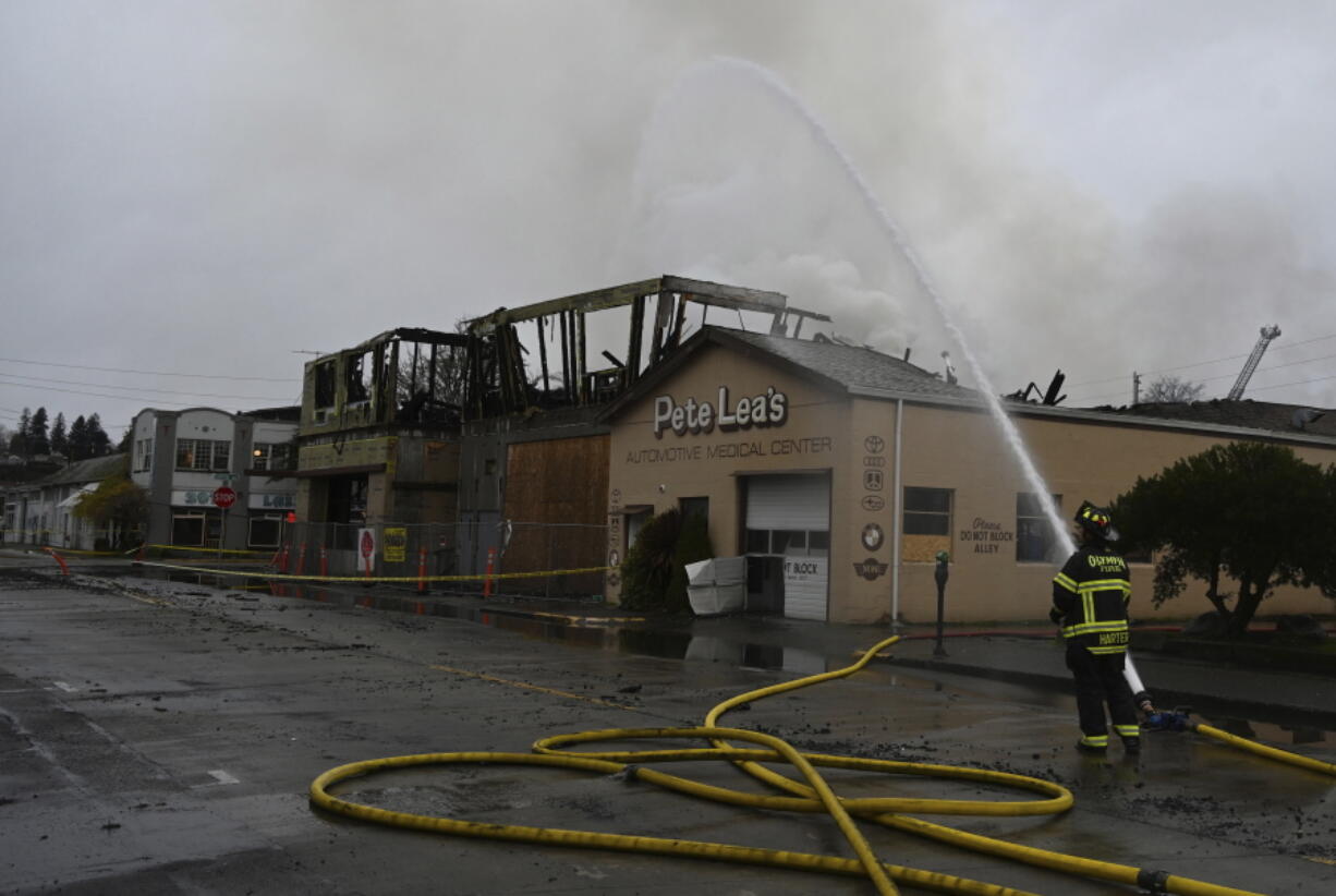 Olympia firefighters responded to a large downtown commercial fire early Wednesday, Dec. 15, 2021 in Olympia, Wash. The fire started around 5 a.m. at a five-story building under construction, according to the Olympia Fire Department and Thurston County dispatchers.