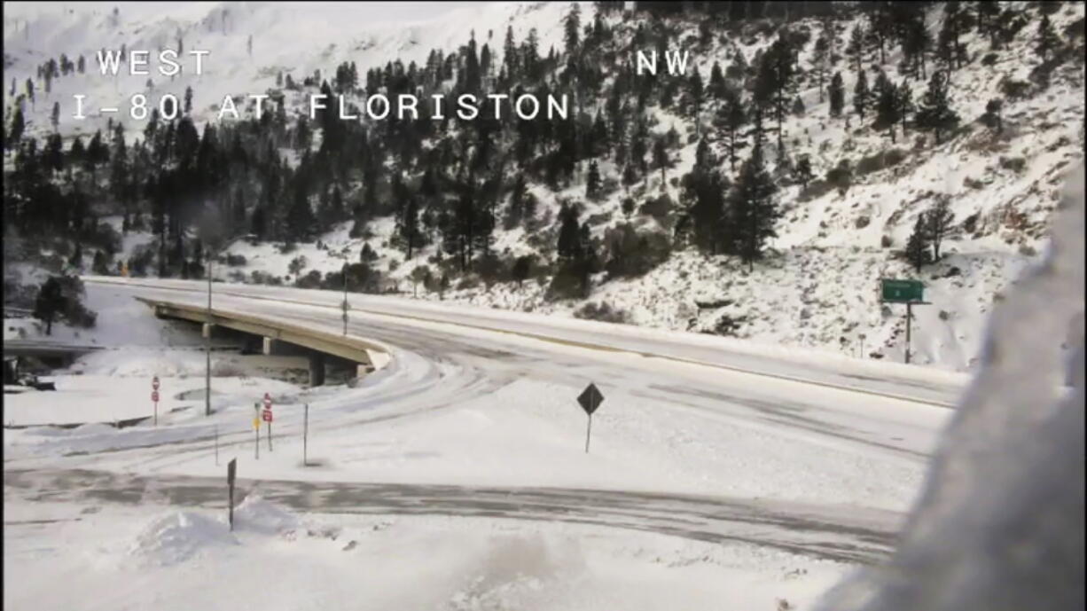 This image from video provided by Caltrans District 3 shows a closed westbound I-80 on Sunday, Dec. 26, 2021. The road from Colfax, Calif., to the Nevada state line was closed due to heavy snowfall.