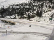 This image from video provided by Caltrans District 3 shows a closed westbound I-80 on Sunday, Dec. 26, 2021. The road from Colfax, Calif., to the Nevada state line was closed due to heavy snowfall.