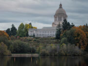 The Washington State Capitol and Supreme Court buildings photographed from Heritage Park on Wednesday, Oct. 21, 2020, in Olympia, Wash.