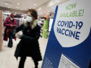 A pharmacy in Grand Central Terminal advertises the COVID-19 vaccine on Thursday, Dec. 9, 2021 in New York City.