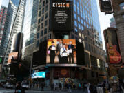 The Vancouver Symphony Orchestra's Young Artists competition has expanded to the national level, which is why this ad featuring Maestro Salvador Brotons and the contest's three winners beamed from Times Square in New York City.