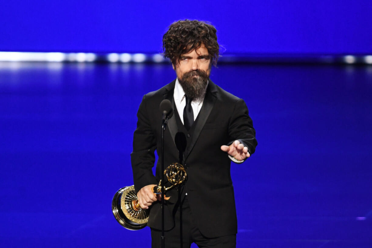 Peter Dinklage accepts the Outstanding Supporting Actor in a Drama Series award for "Game of Thrones" onstage Sept. 22, 2019, during the 71st Emmy Awards at Microsoft Theater in Los Angeles.