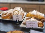 Pastries sit in the display case at Sweetly Bakery in Battle Ground.