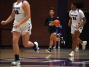 Skyview junior Jordan Labrador-Hallett, center, directs the team Tuesday, Jan. 4, 2022, during the Storm’s 66-40 win against the Timberwolves at Heritage High School.