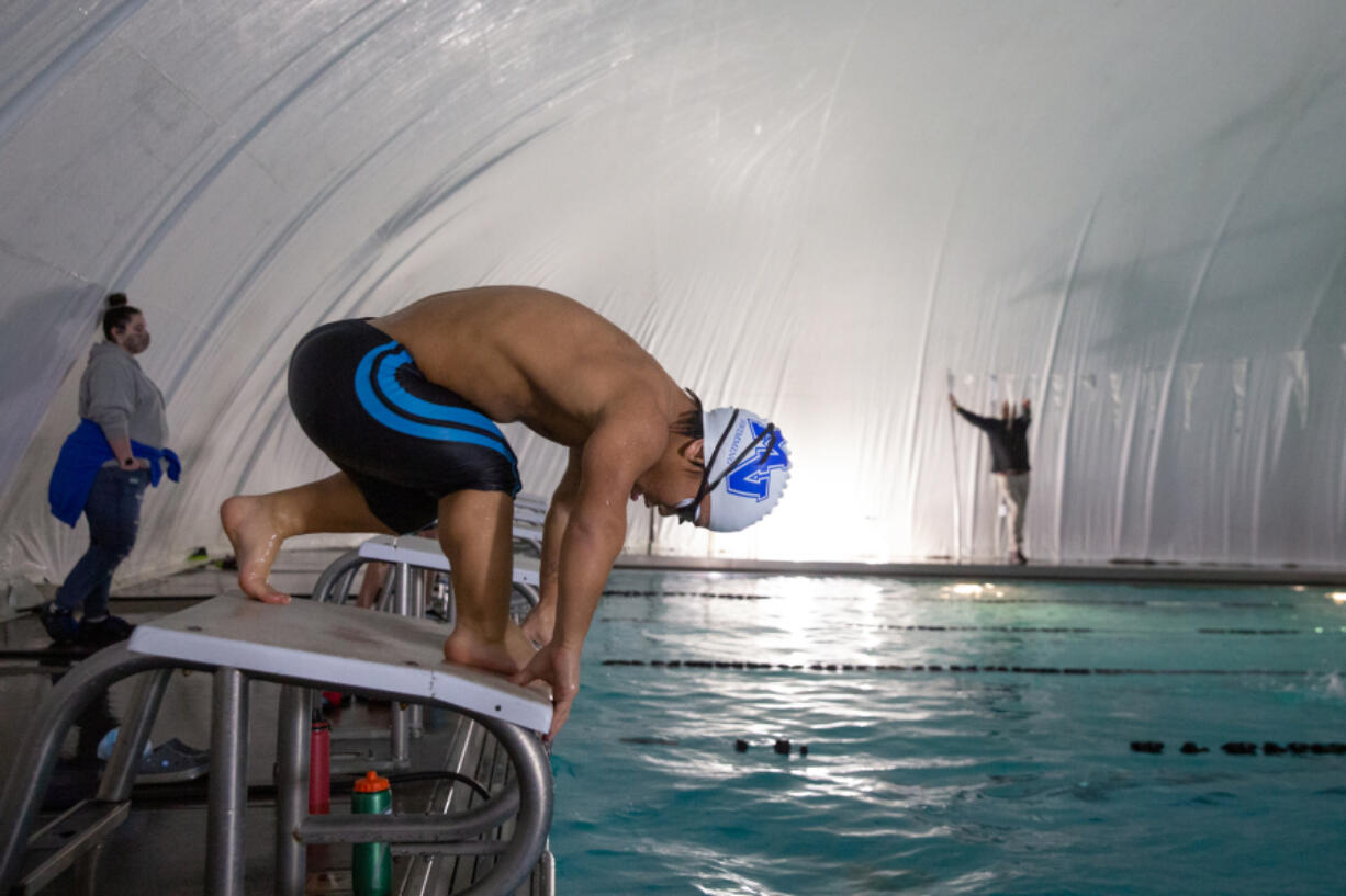 Mountain View High School junior Griffin Barlow, shown here during a recent swim practice at Cascade Athletic Club, was born with achondroplasia, the most common form of dwarfism. At 4 feet tall, the swimming pool is where Barlow finds success and self-confidence. "You don't hear that a lot," he said.