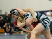 Prairie's Kennedy Wilcox throws Union's Niah Cassidy in the 125-pound finals at the Norm Friehauf Clark County Championships on Saturday, Jan. 15, 2022, at Skyview High School.