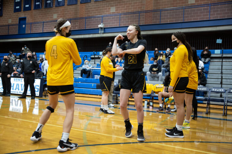 Hudson’s Bay's Paytin Ballard, center, is introduced before a game against Hockinson on Tuesday, Jan. 4,2022, at Hockinson High School in Brush Prairie.