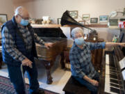 The Two Rivers Heritage Museum in downtown Washougal hosts group tours while its winter hours are limited. Camas Washougal Historical Society volunteer coordinator Lois Cobb, right, and her husband, Jim Cobb, the society's president, are among the many docents who lead the museum's tours.