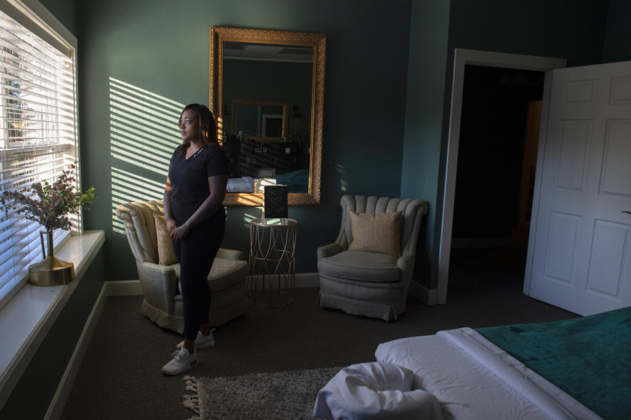 Bre'Anna Glynn, owner of The Eucalyptus Lounge, has struggled as the omicron variant sweeps through the county, causing regular customers to cancel or delay their massage appointments.