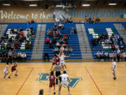 The ball is tipped off as Mountain View takes on Prairie during the first quarter of a basketball game at Mountain View High School on Friday, January 28, 2022. This is the final basketball season that will be played in the schools original gym.