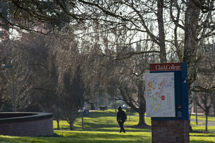 A student strolls through campus at Clark College on a sunny, chilly winter morning Friday. Following a pattern of higher education across the country, Clark's student enrollment has seen a dramatic decline since the onset of the COVID-19 pandemic.