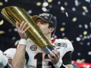 Georgia's Stetson Bennett celebrates after a 33-18 win in the College Football Playoff championship game against Alabama Tuesday in Indianapolis.