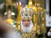 Russian Orthodox Patriarch Kirill delivers the Christmas Liturgy in the Christ the Saviour Cathedral in Moscow, Russia, Thursday, Jan. 6, 2022. Parishioners wearing face masks to protect against coronavirus, observed social distancing guidelines as they attended the liturgy Orthodox Christians celebrate Christmas on Jan. 7, in accordance with the Julian calendar.