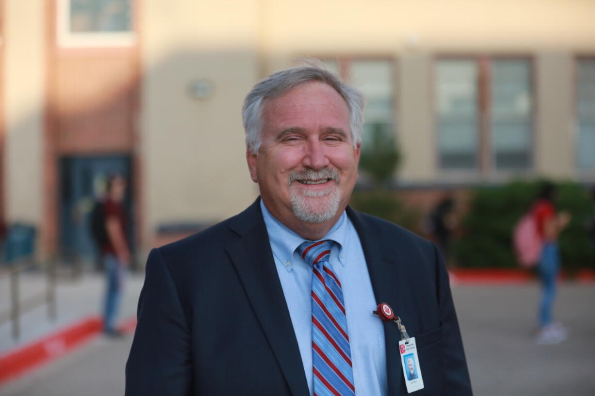 FILE - Albuquerque Public Schools superintendent Scott Elder poses for a photo outside of Highland High School on Aug. 11, 2021, in Albuquerque, N.M. Albuquerque Public Schools says classes will be canceled Friday, Jan. 14, 2022, for a second day after a cyber attack on the district's student database prompted a near-total shutdown of classes on Thursday, Jan. 13.