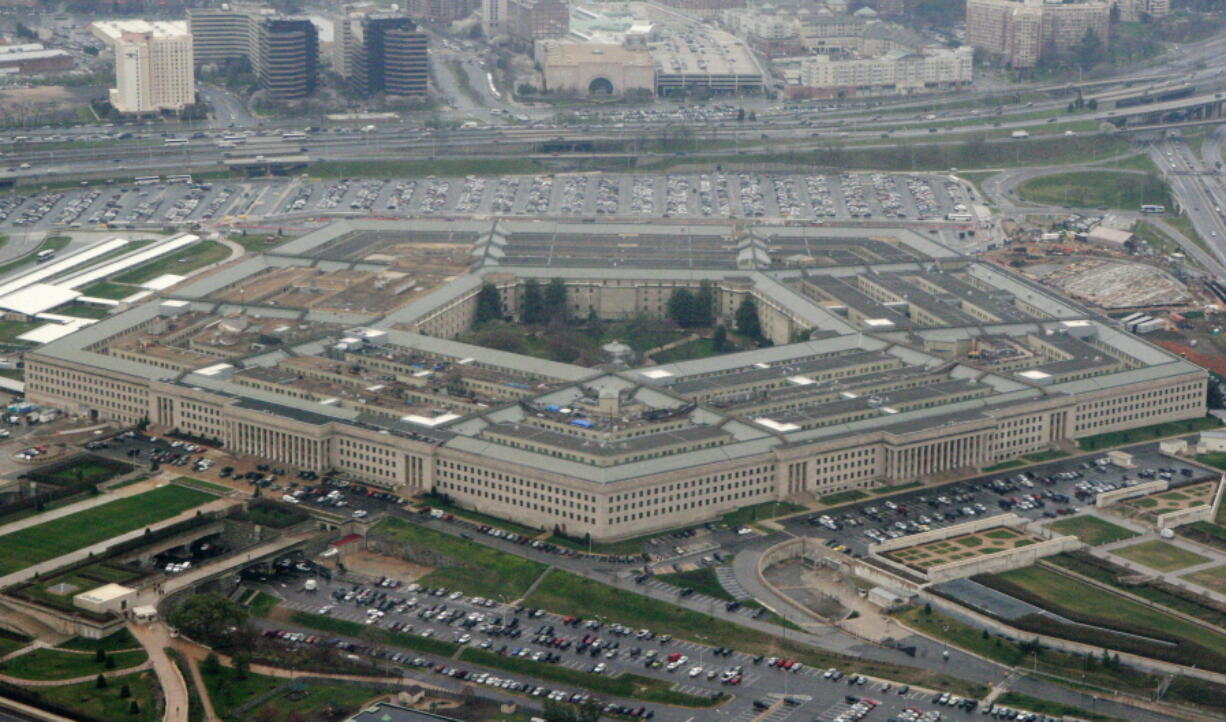 FILE - This March 27, 2008, file photo, shows the Pentagon in Washington. The U.S. Army, for the first time, is offering a maximum enlistment bonus of $50,000 to highly skilled recruits who sign up for six years.