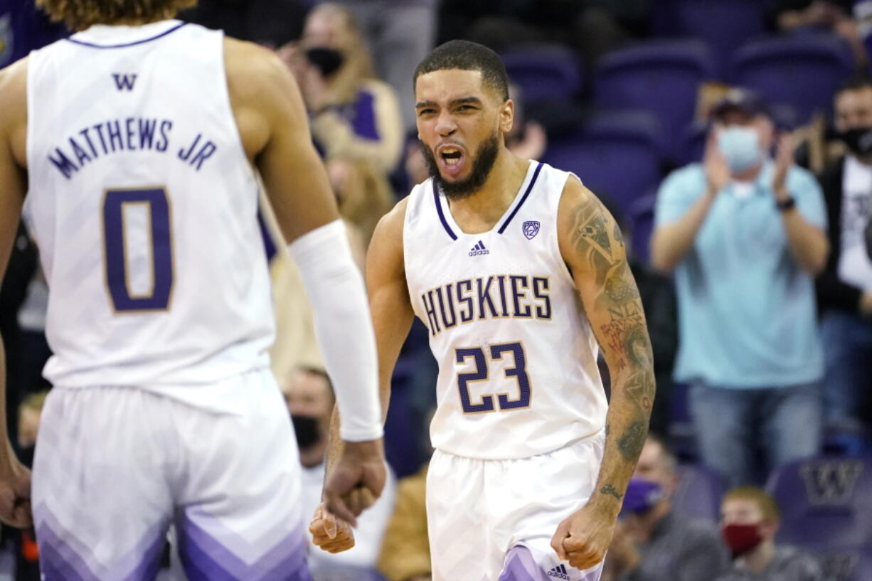 Washington's Terrell Brown Jr. reacts to a call in their favor against California in the second half of an NCAA college basketball game Wednesday, Jan. 12, 2022, in Seattle. Washington won 64-55.