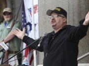 FILE - Stewart Rhodes, founder and president of the pro gun rights organization Oath Keepers speaks during a gun rights rally at the Connecticut State Capitol in Hartford, Conn., Saturday April 20, 2013.   Rhodes has been arrested and charged with seditious conspiracy in the Jan. 6 attack on the U.S. Capitol. The Justice Department announced the charges against Rhodes on Thursday.