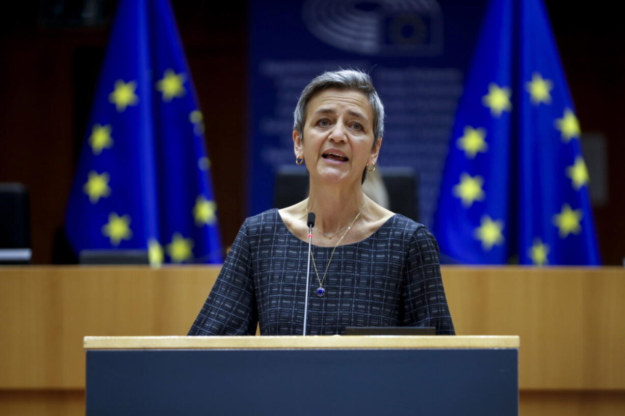 FILE - European Commissioner Margrethe Vestager addresses European lawmakers at the European Parliament in Brussels, on May 18, 2021. The European Union on Thursday blocked the merger between South Korean shipbuilders Hyundai and Daewoo, saying a union between two of the world's biggest players in the industry would have given the combined company a global stranglehold on the production of liquified natural gas carriers. EU Competition Commissioner Margrethe Vestager says the merger would have led to "fewer suppliers and higher prices for large vessels transporting LNG." European customers account for almost half the orders in the $45 billion market.