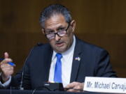 FILE - Michael Carvajal, director of the Federal Bureau of Prisons, testifies during a Senate Judiciary Committee hearing examining issues facing prisons and jails during the coronavirus pandemic on Capitol Hill in Washington, on June 2, 2020. Carvajal is resigning amid increasing scrutiny over his leadership in the wake of Associated Press reporting that uncovered widespread problems at the agency, including a recent story detailing serious misconduct involving correctional officers.