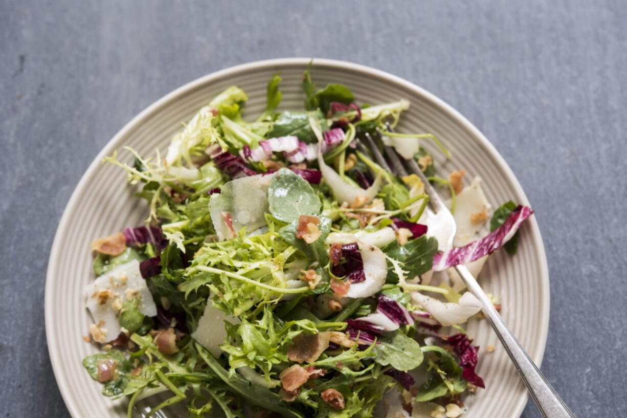 A recipe for greens with walnuts, parmesan and pancetta vin.