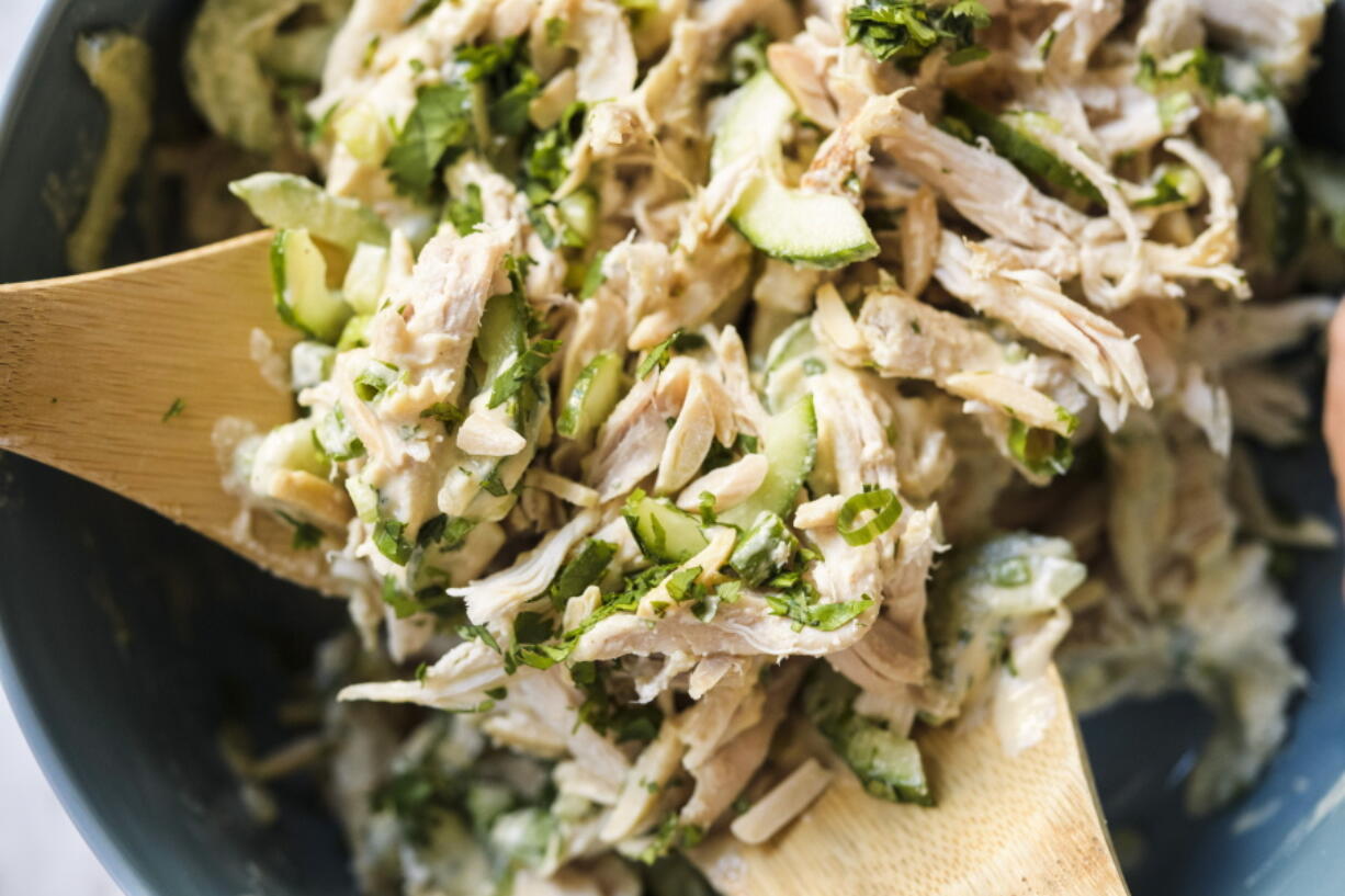 This image released by Milk Street shows a recipe for miso ginger chicken salad.