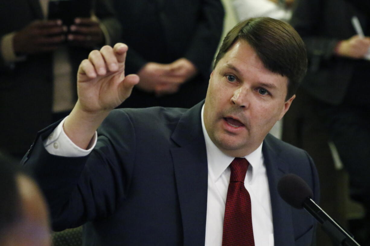 Cliff Johnson, director of the Roderick and Solange MacArthur Justice Center at the University of Mississippi School of Law, is shown speaking to state lawmakers about prisons in this Feb. 13, 2020 file photograph, at the Mississippi State Capitol. A report released by the center on Jan. 12, 2022, says thousands of people in Mississippi are held in county jails for long periods while waiting to go on trial because they are too poor to afford bail, judges may deny bail altogether or public defenders might not be available when they're needed. (AP Photo/Rogelio V.