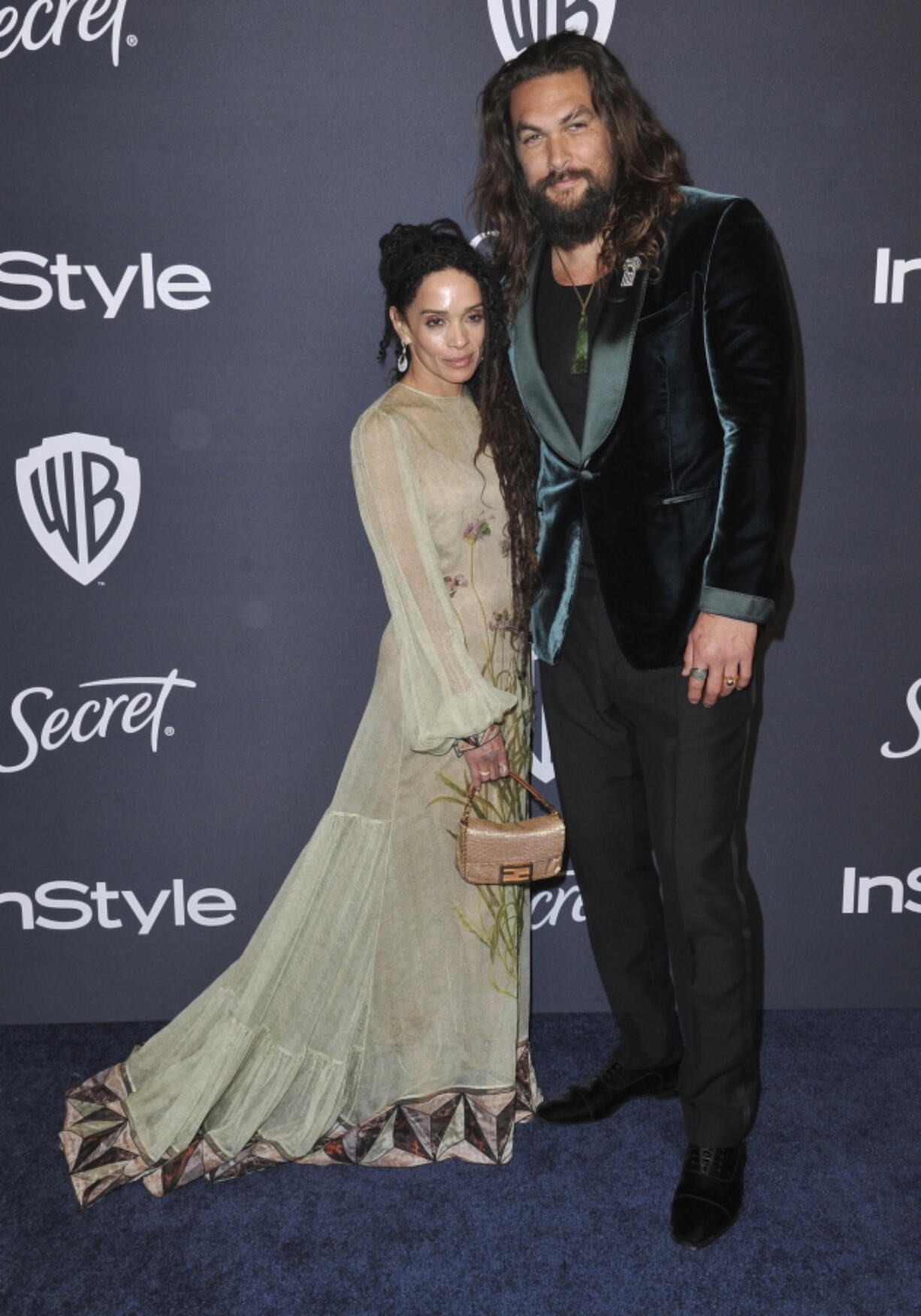 FILE - Lisa Bonet, left, and Jason Momoa arrive at the InStyle and Warner Bros. Golden Globes afterparty at the Beverly Hilton Hotel on Sunday, Jan. 5, 2020, in Beverly Hills, Calif. The couple  have ended their 16-year relationship. A joint statement posted on the '??Aquaman'?? star'??s Instagram page Wednesday, Jan. 12, 2022, said that Momoa and his wife were parting ways.