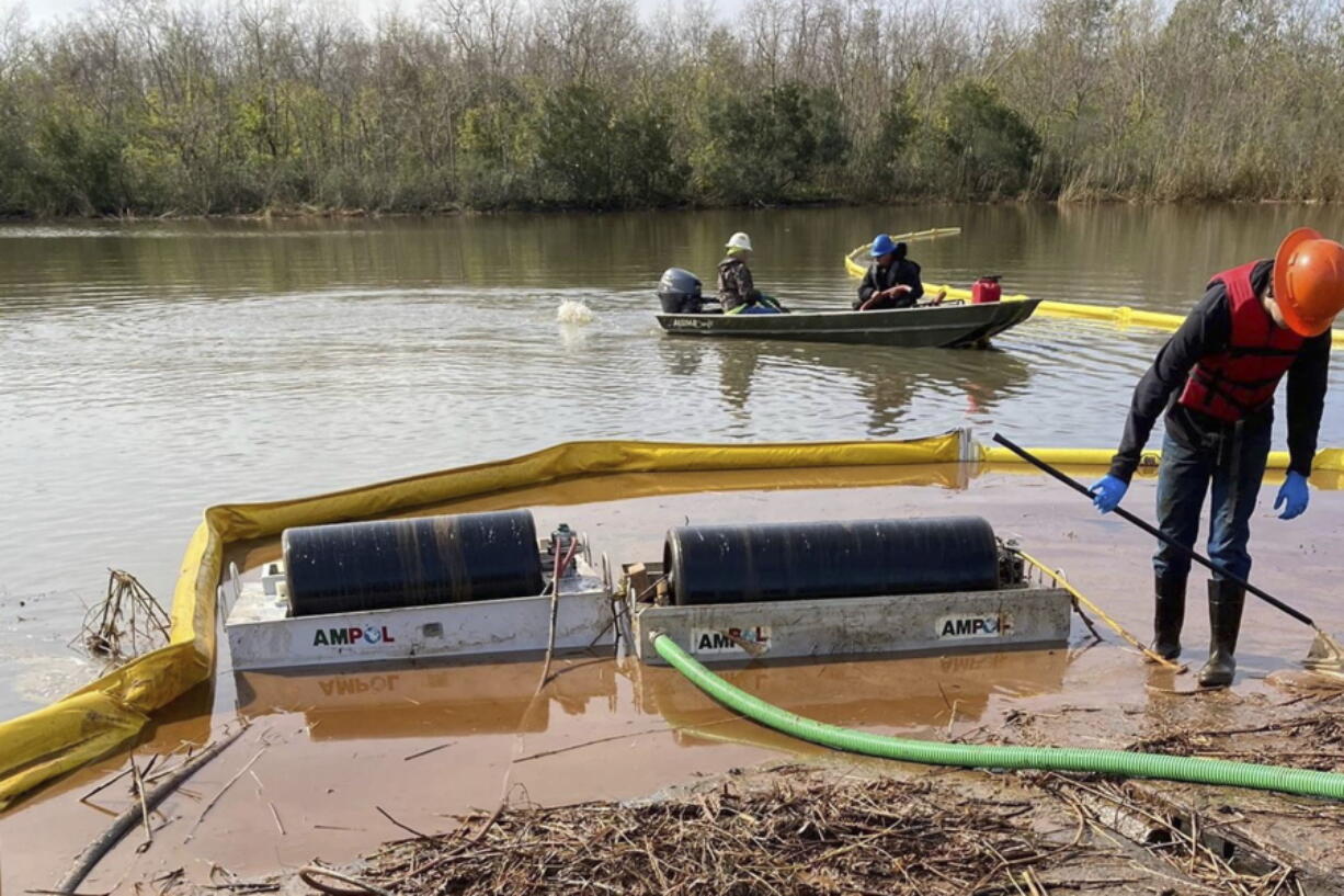 This undated photo provided by the Louisiana Department of Environmental Quality on Wednesday, Jan. 12, 2022, shows cleanup work at the site where more than 300,000 gallons of diesel spilled on Dec. 27, 2021, just outside New Orleans. An October 2020 inspection revealed external corrosion along a 22-foot section of pipe in the same area as the spill. But documents show repairs were delayed after a subsequent inspection indicated the corrosion was not bad enough to require work immediately under federal regulations.