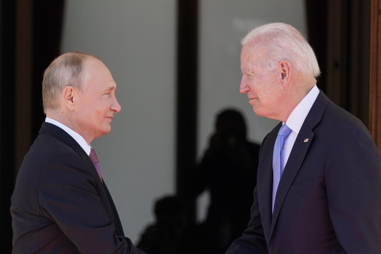 FILE - President Joe Biden and Russian President Vladimir Putin, arrive to meet at the 'Villa la Grange', June 16, 2021, in Geneva, Switzerland. While Biden has assured Russian President Vladimir Putin of economic consequences "like none he's ever seen" if Russia invades Ukraine, some major European allies have demonstrated less overt enthusiasm for huge economic penalties.