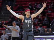 Washington State guard Tyrell Roberts reacts during the second half of the team's NCAA college basketball game against Utah on Saturday, Jan. 8, 2022, in Salt Lake City.