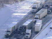 Motorists sit stranded on Interstate 95 in Northern, Va., on Tuesday, Jan. 4, 2022. Hundreds of motorists were stranded all night in snow and freezing temperatures along a 50-mile stretch of Interstate 95 after a crash involving six tractor-trailers in Virginia, where authorities were struggling Tuesday to reach them.