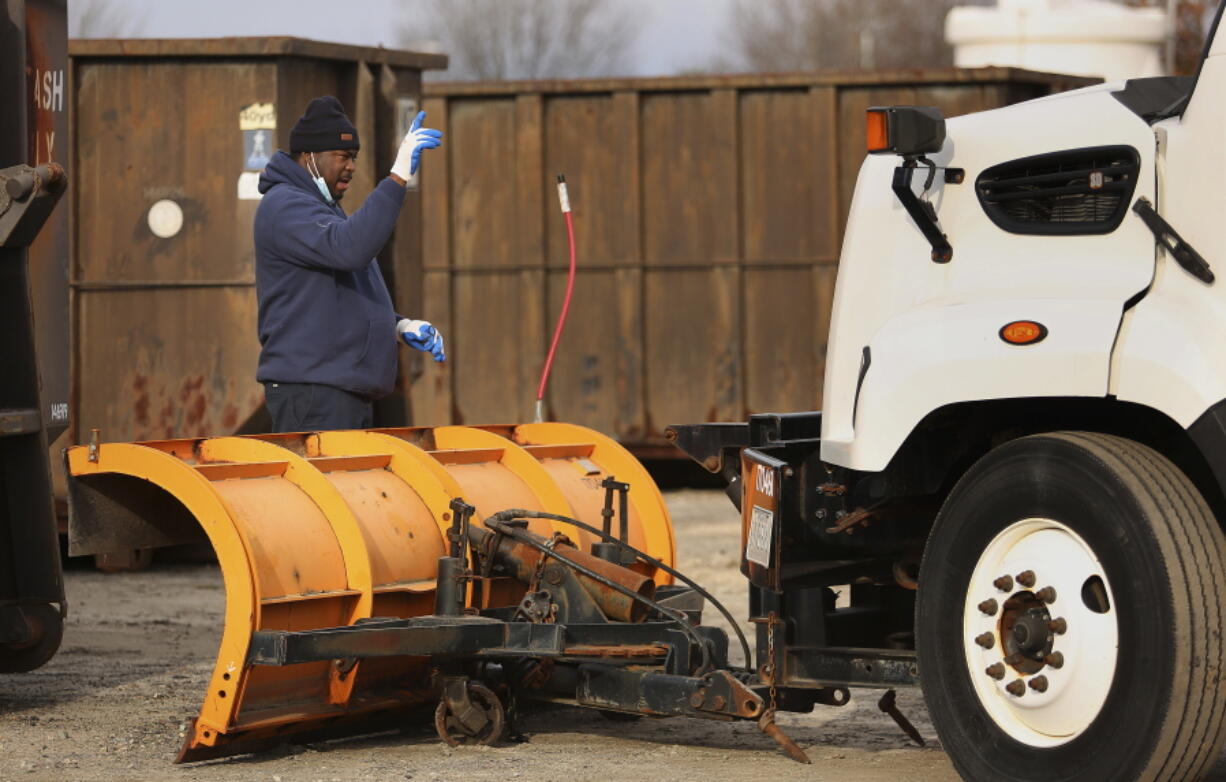 Virginia Beach, Va., Public Works crews prepare Thursday, Jan. 20, 2022, morning for snow from an impending winter storm. (Stephen M.