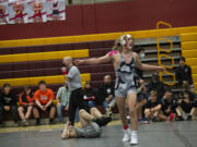 Union's Elijah Cassidy celebrates his 4-2 win over Gunnar Henderson of Battle Ground in the 145-pound final at the 4A district wrestling tournament at Prairie on Saturday, Feb. 5, 2022.