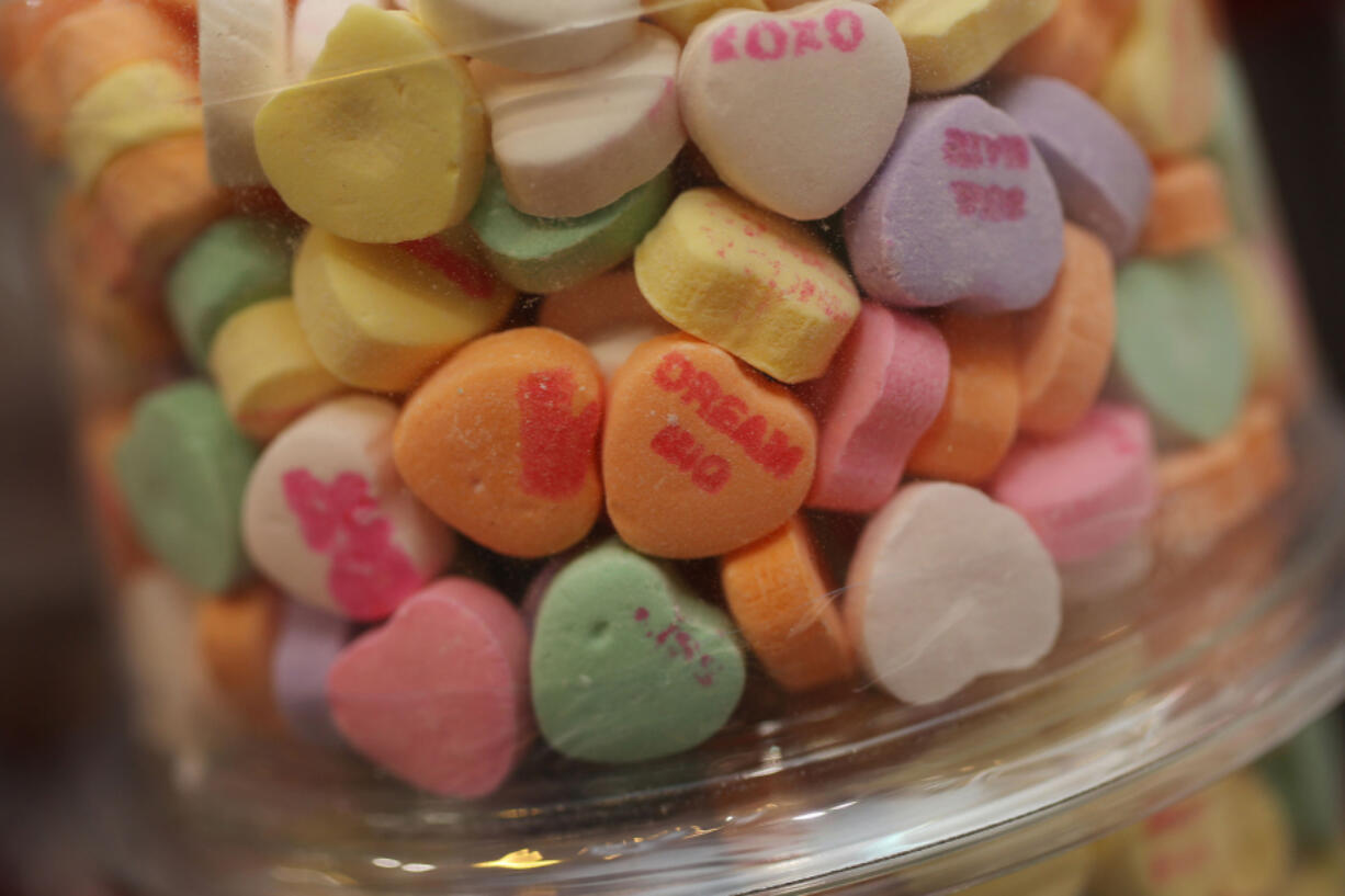 Sweetheart candy hearts are seen on the shelf at the To The Moon Marketplace on Jan. 29, 2019, in Wilton Manors, Florida.