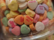 Sweetheart candy hearts are seen on the shelf at the To The Moon Marketplace on Jan. 29, 2019, in Wilton Manors, Florida.