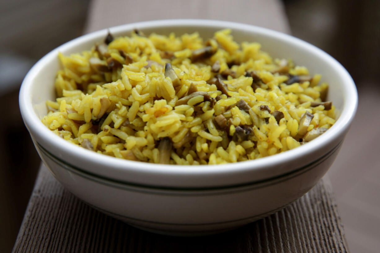 Mushroom rice with turmeric, an easy vegetable side dish, shown on Wednesday, Jan. 19, 2022. (Hillary Levin/St. Louis Post-Dispatch/TNS) (Hillary Levin/St.