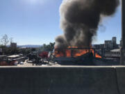 A homeless camp on and below the West Mill Plain Extension Bridge, just west of downtown Vancouver, burned on Saturday afternoon.