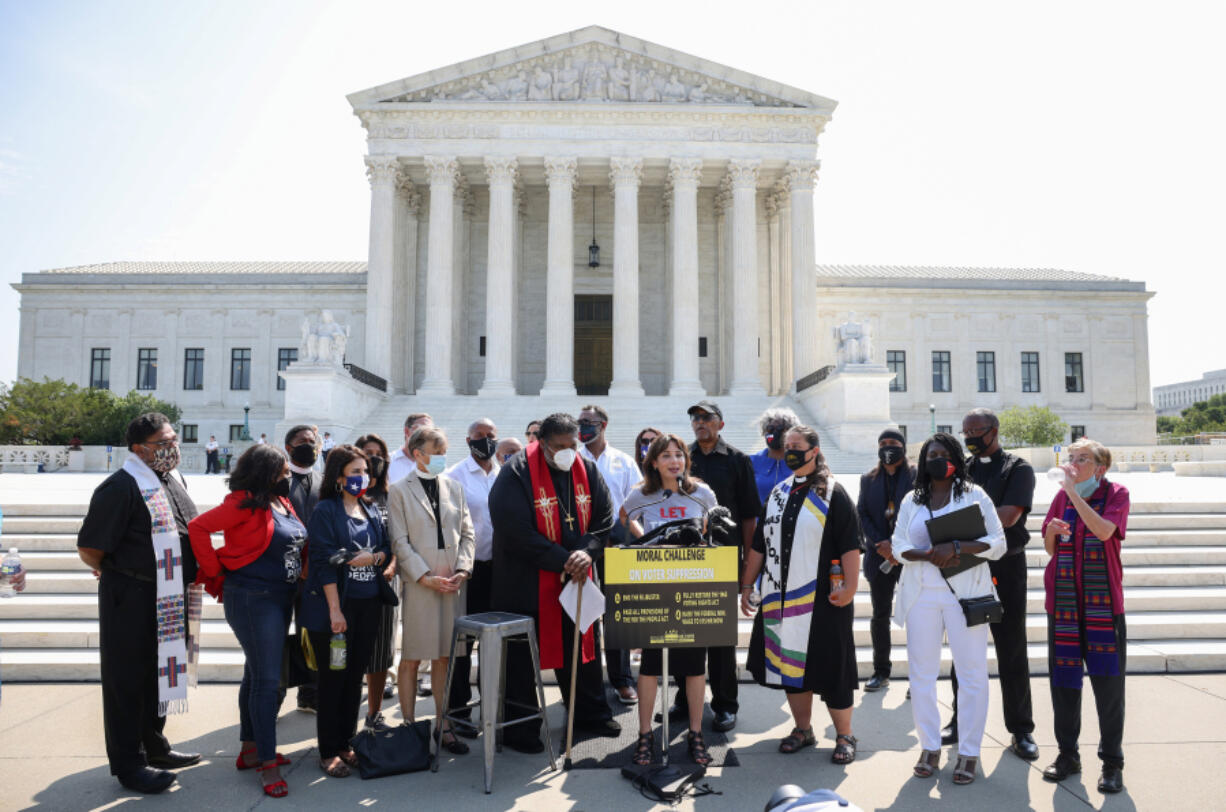 Texas State representatives and religious leaders prepare to deliver a petition to Senate Majority Leader Charles Schumer calling for the passage of the For The People Act and restoring the Voting Rights Act, at the U.S. Supreme Court last year.