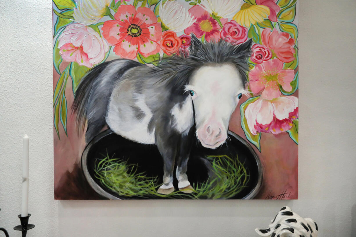 A painting by artist Nancy Hache of Peabody, a miniature horse with dwarfism, whose videos generated more than 600 million views on social media for Faithful Friends Mini Horses in Bonsall. Peabody died last fall at four months of age.