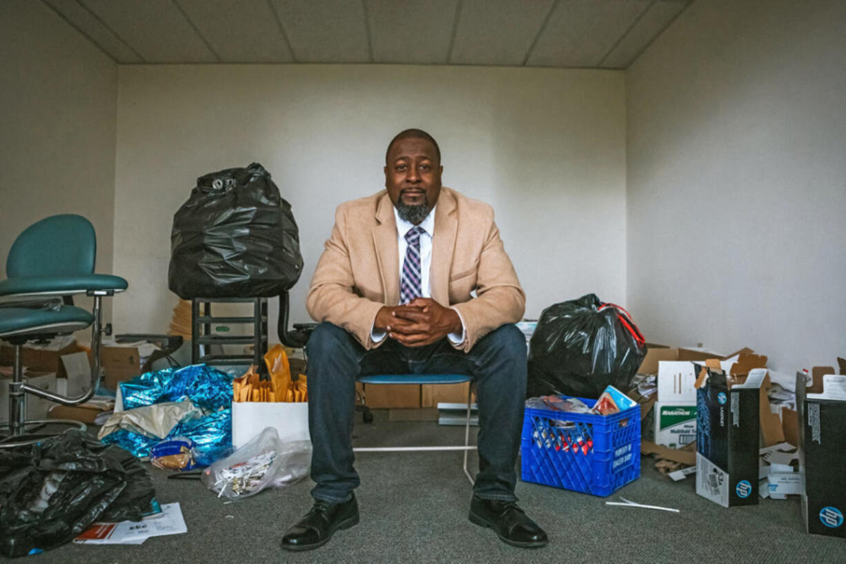 Drayton Jackson, founder of the Foundation for Homeless and Poverty Management, is seen here surrounded by various items as he set up his new office space in early 2021. Jackson was homeless for two decades and now is an advocate for the unhoused, leading a state anti-poverty work group.