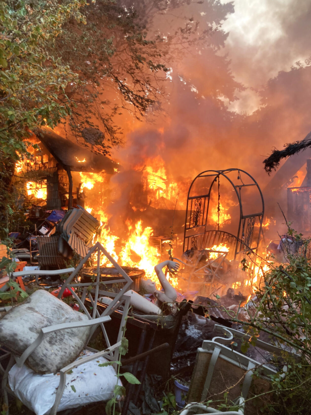 A fire in the Cherry Grove area near Battle Ground destroyed a historic church, a house and other structures in the early morning hours of July 5. Surveillance video showed a teenager stepping out of a car and throwing a lit firework at the church.