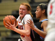 Camas sophomore Addison Harris prepares for a shot Friday, Feb. 11, 2022, during the Papermakers’ 65-34 win against Rogers-Puyallup at Camas High School.