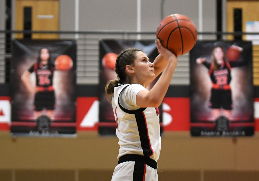 Camas sophomore Reagan Jamison shoots a three-pointer Friday, Feb. 11, 2022, during the Papermakers’ 65-34 win against Rogers-Puyallup at Camas High School.